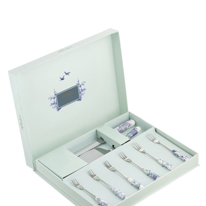 Aynsley Archive Blue Pastry Set featuring fine china handles with historic blue artwork cake slice knife and pastry forks on a rustic wooden table