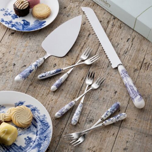 Aynsley Archive Blue Pastry Set featuring fine china handles with historic blue artwork cake slice knife and pastry forks on a rustic wooden table